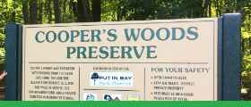 An outdoor park sign for a nature preserve